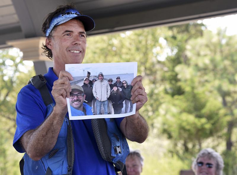 Ed Lewandowski noticed the growing numbers of paddlers in the area, so he and a group of fellow paddlers began this project. Lewandowski shows a photo of the frigid day they met on the pier to begin the map.
